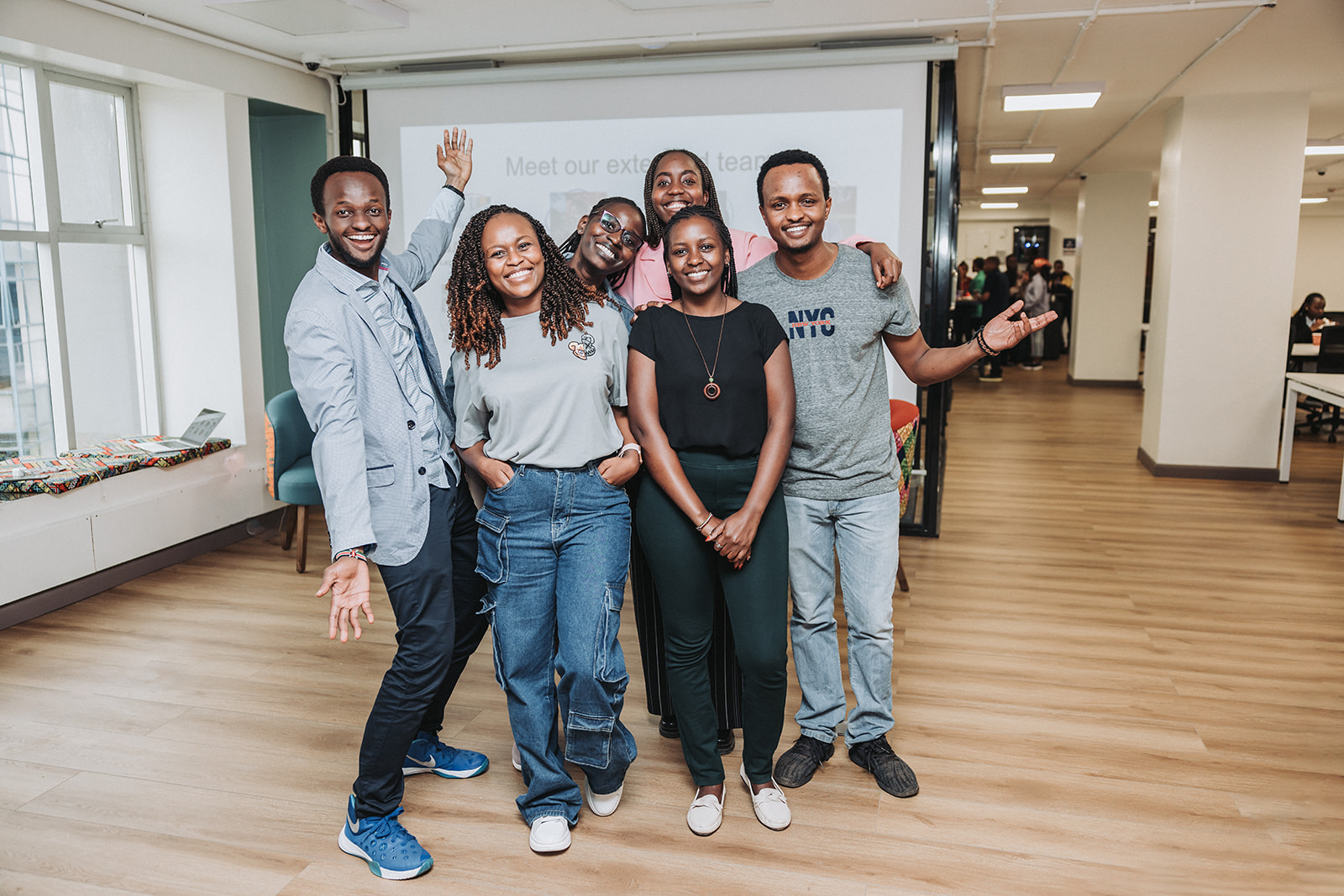 Venture for Africa team members and participants posing together at an event