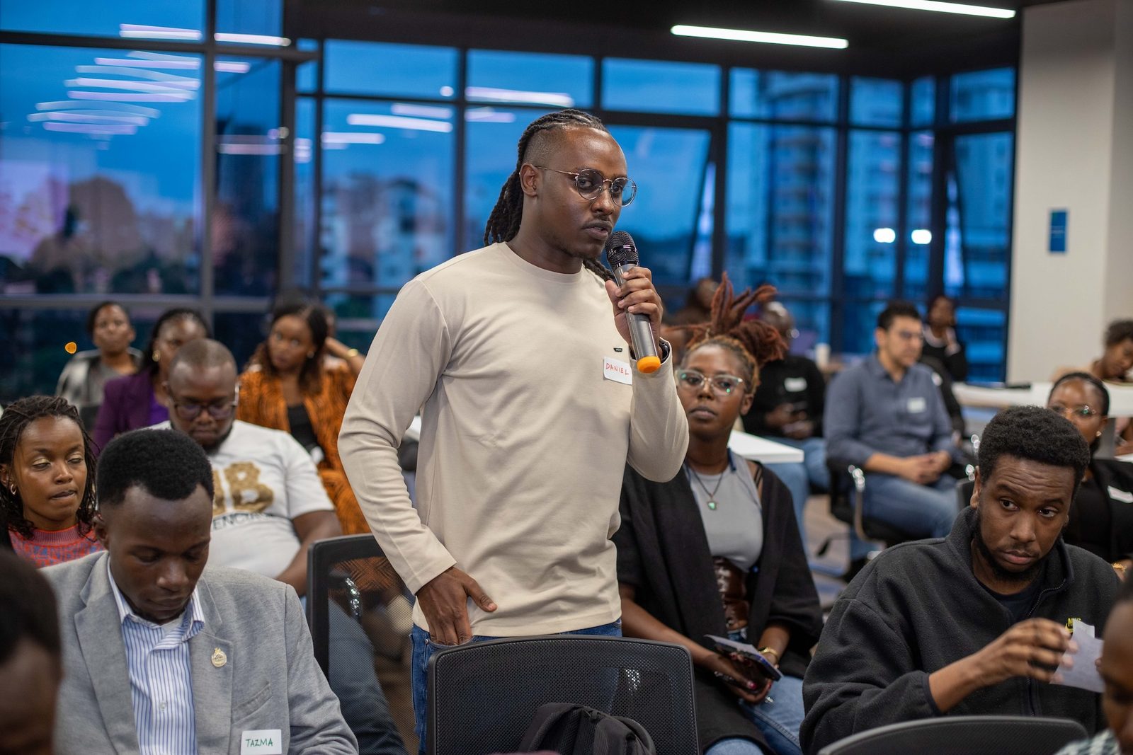 A speaker addressing a room of attendees at a VFA event